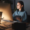 Woman creates interactive brochure with onOffice